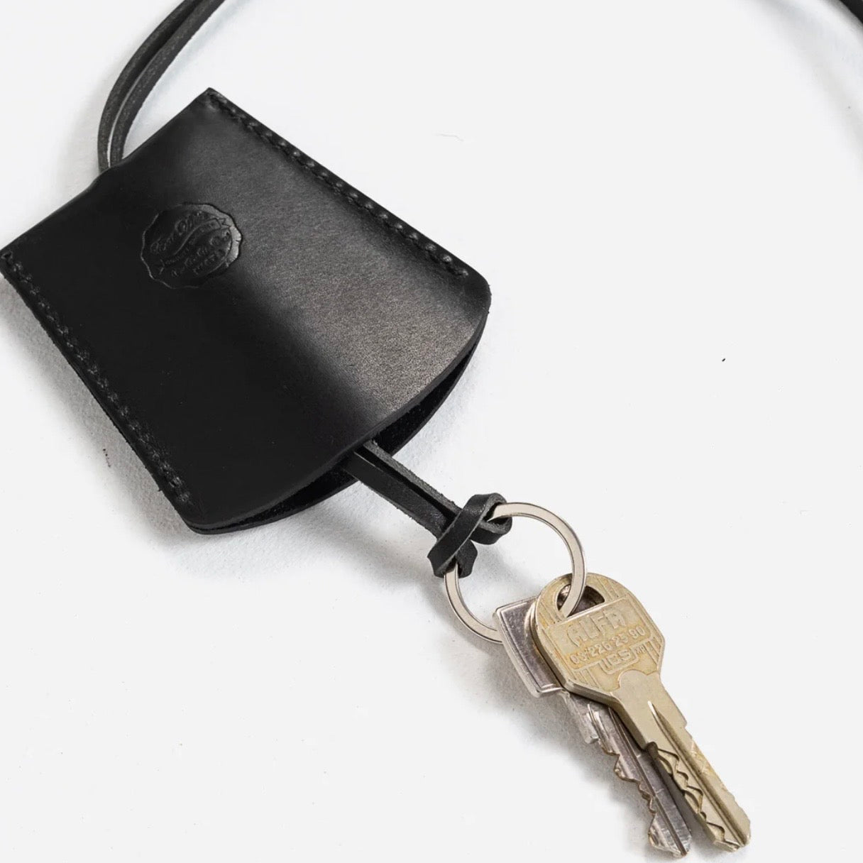 Eat Dust Neck Key Hanger Black
